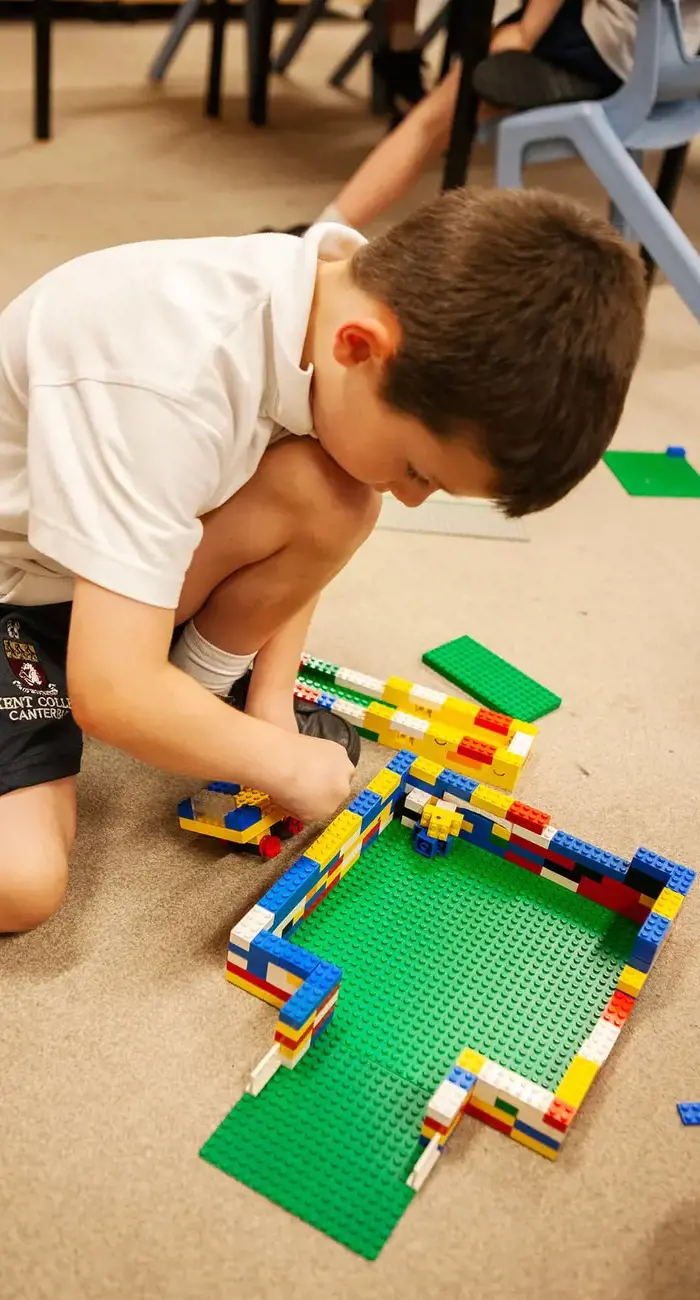 Junior school pupil at Lego club